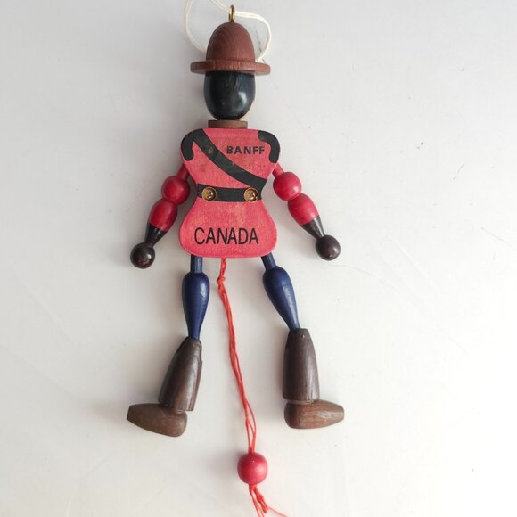 Vintage Wooden Canadian Mountie Pull String Puppet Christmas Ornament 8in High - Picture 2 of 2